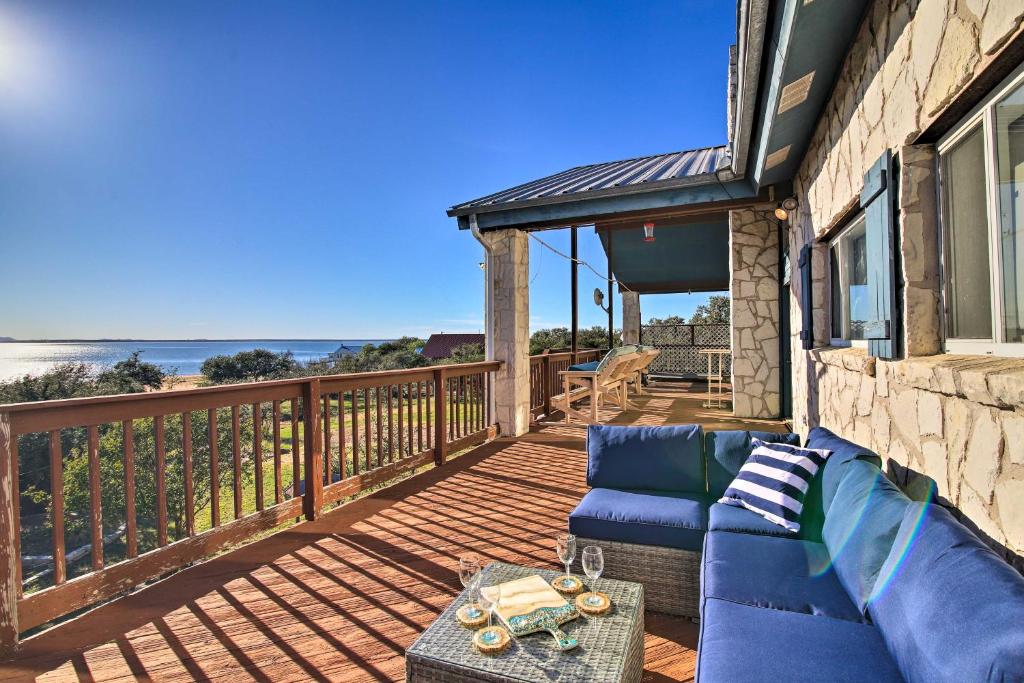 Sunny Lakefront Escape with Private Beach and Deck